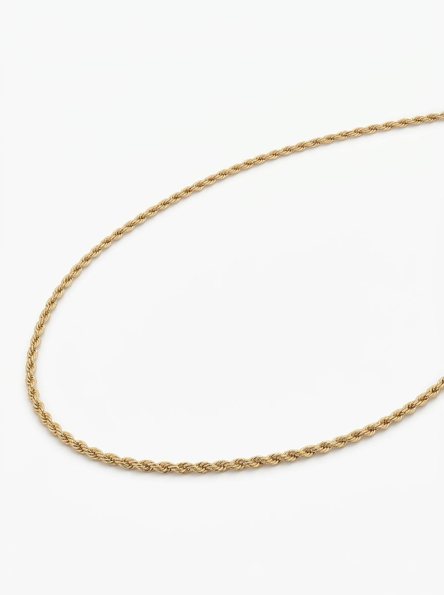 Gold rope chain necklace laid flat showing the twisted links