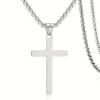 Close-up of the stainless steel cross pendant and box-link chain