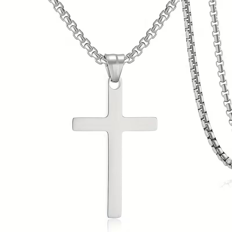 Close-up of the stainless steel cross pendant and box-link chain