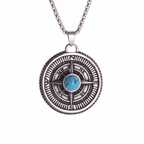 Turquoise compass pendant necklace in silver on a white background