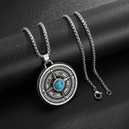 Close-up of the turquoise stone and etched compass markings