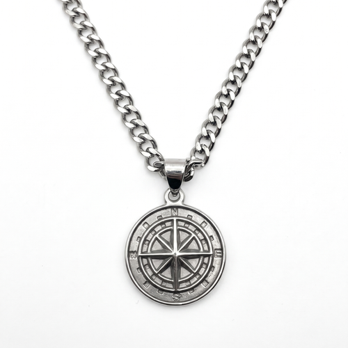 Silver compass pendant necklace on a curb-link chain